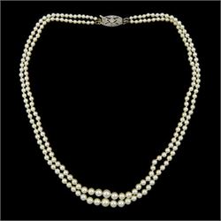 Early - mid 20th century double strand graduating pearl necklace, on 9ct white gold old cu...