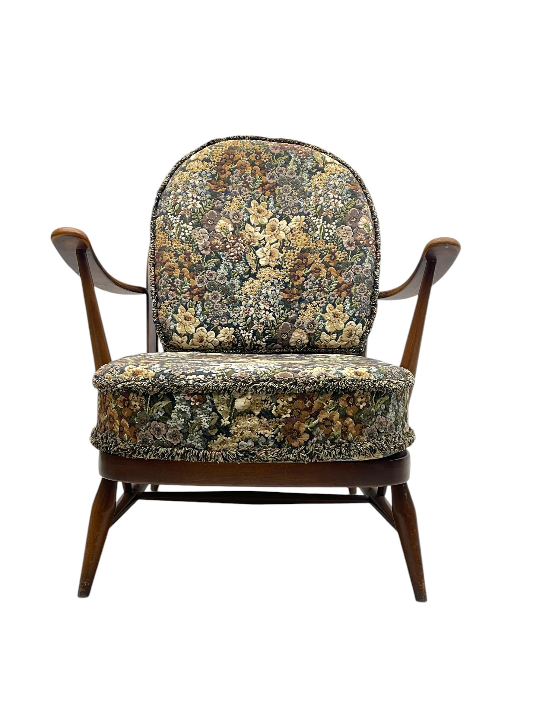 Lucian Ercolani for Ercol - mid-20th century beech and elm 'Windsor 203' two-seat sofa, wingback design upholstered in floral pattern over sprung seat and backrest, open curved arms, on splayed supports with stretchers (W133cm, D87cm, H90cm); matching easy chair (W70cm, D97cm, H82cm)