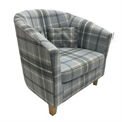 Tub shaped armchair, upholstered in tartan fabric