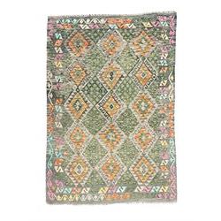 Kilim grey and green ground rug, overall geometric design decorated with lozenges