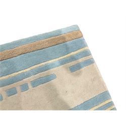 Contemporary pale indigo and beige ground rug, decorated with alternating stripes and geometric shapes