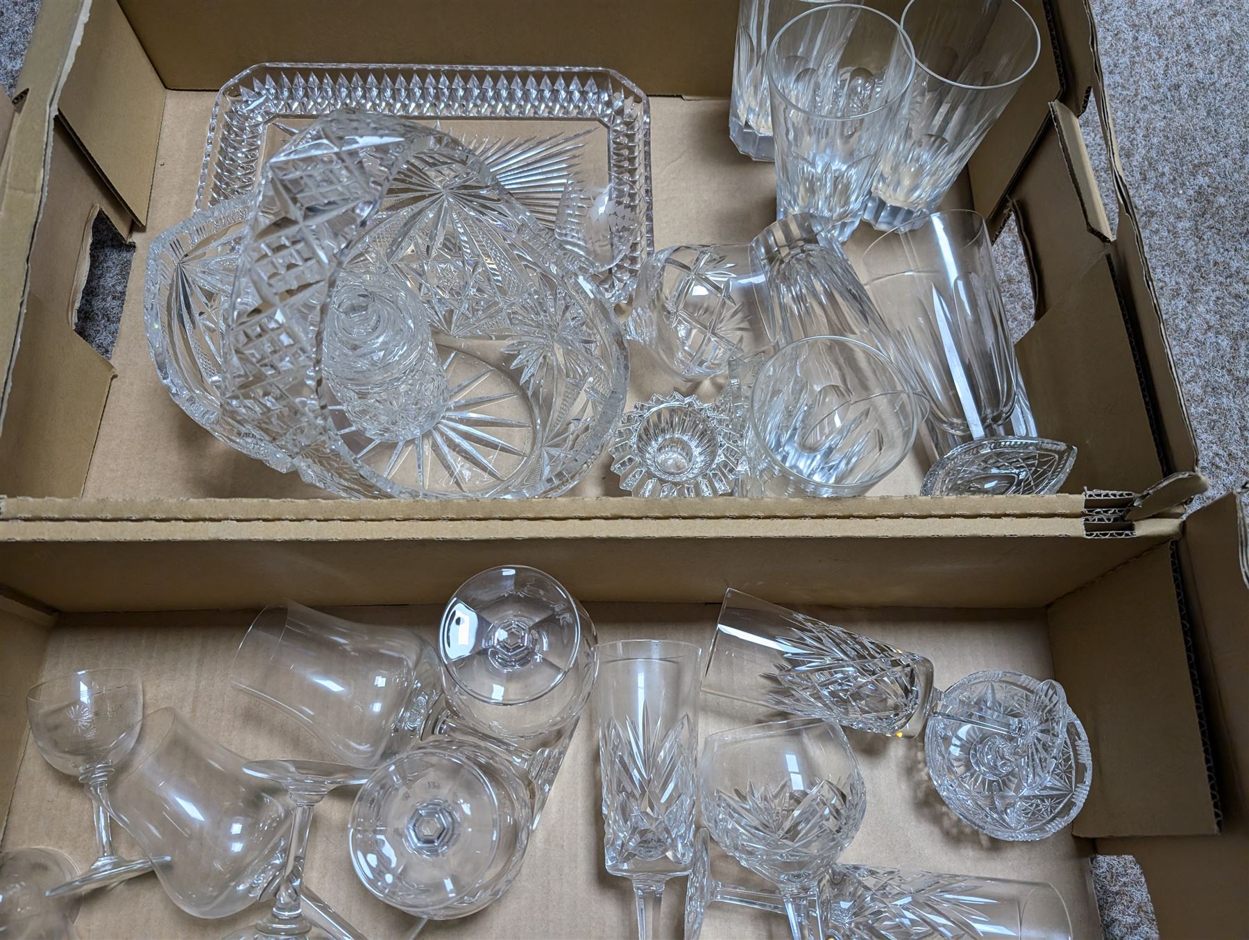 Large collection of glassware, including coloured and cut glass, in three boxes