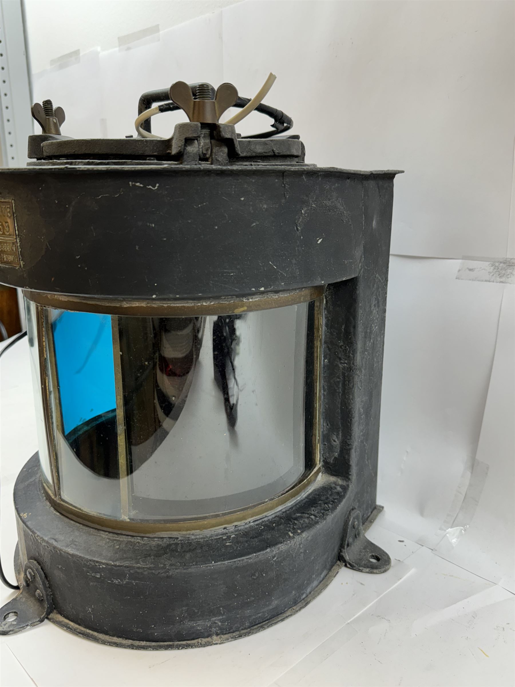 Meteorite ship's lamp converted to electricity, painted in black matte finish, with applied brass plaque inscribed 'Trawler' and a further plaque inscribed 'Meteorite A10153', H42cm