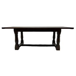 20th century Jacobean design oak refectory dining table, rectangular plank top with cleated ends, on turned supports united by H-stretchers 