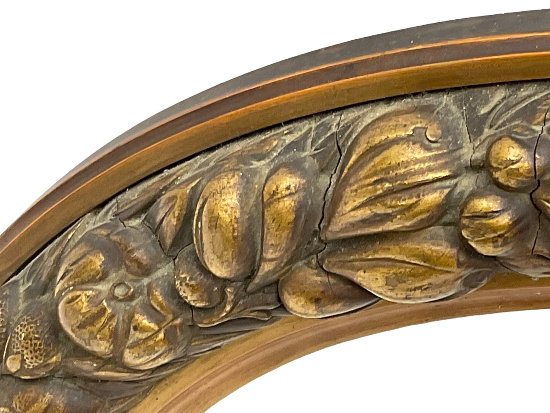 20th century giltwood and gesso oval wall mirror, the frame decorated with moulded fruit and foliage, bevelled mirror plate 