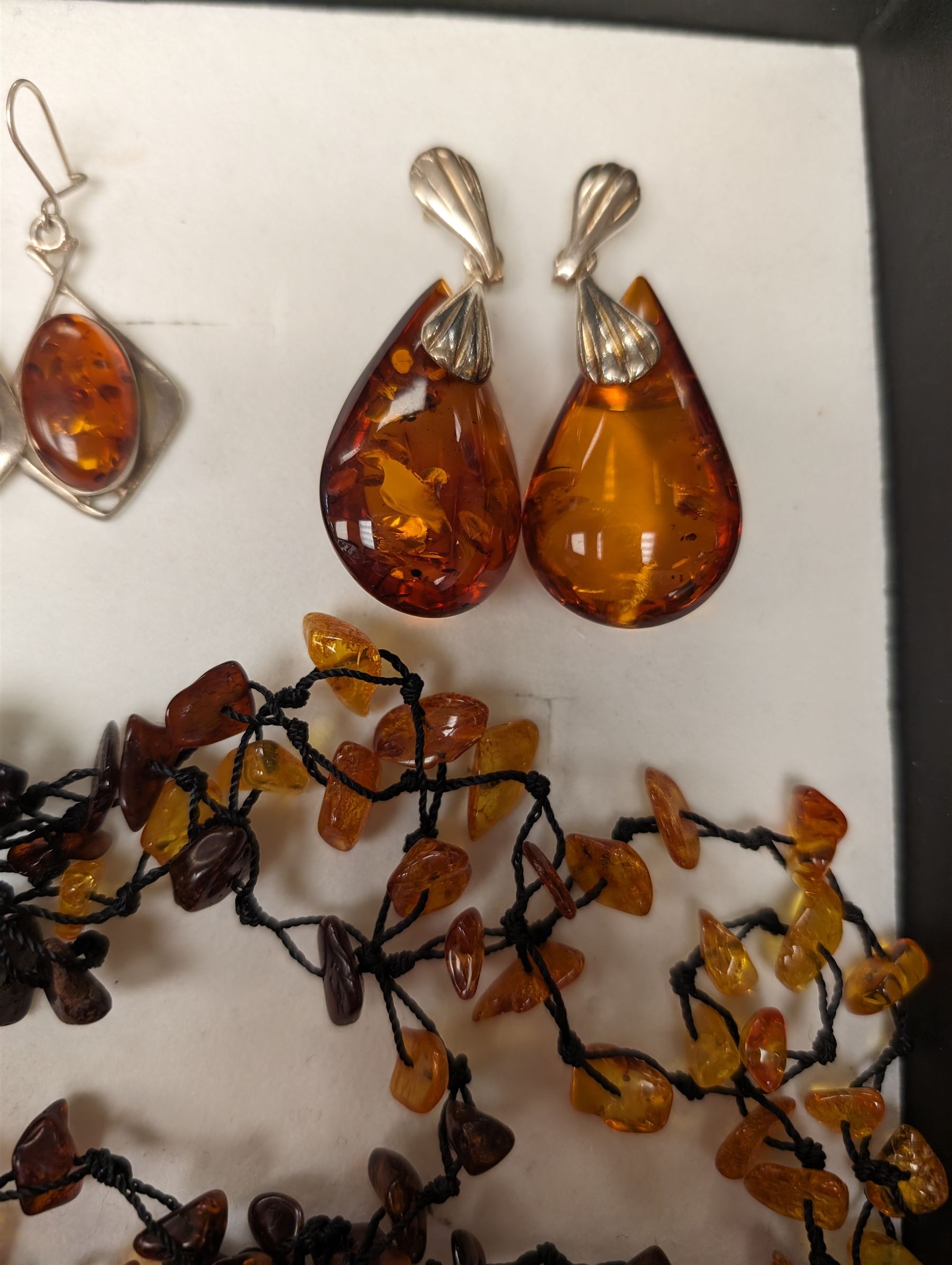 Baltic amber and amber style beaded jewellery, including earrings and necklaces