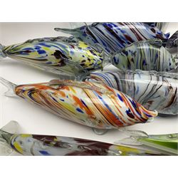Collection of mid 20th century murano style glass fish, each with multi coloured inclusions largest L42cm