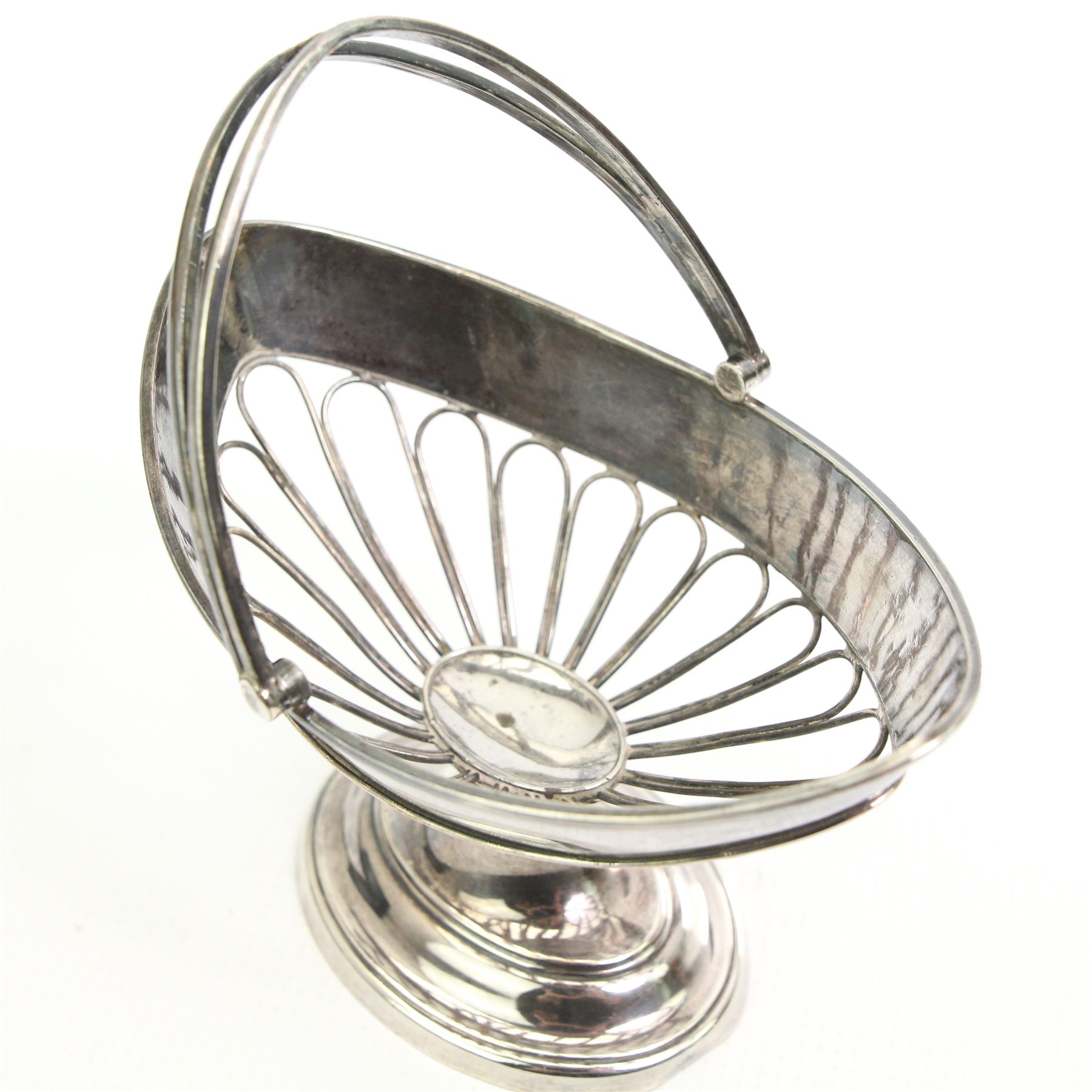 George III Old Sheffield Plate navette form pierced basket with swing handle, H17cm, early 20th century and later bone and mother of pearl fans, 19th/ early 20th century turned lignum vitae box, with mother of pearl inlay, two silver-plated egg cutters etc  