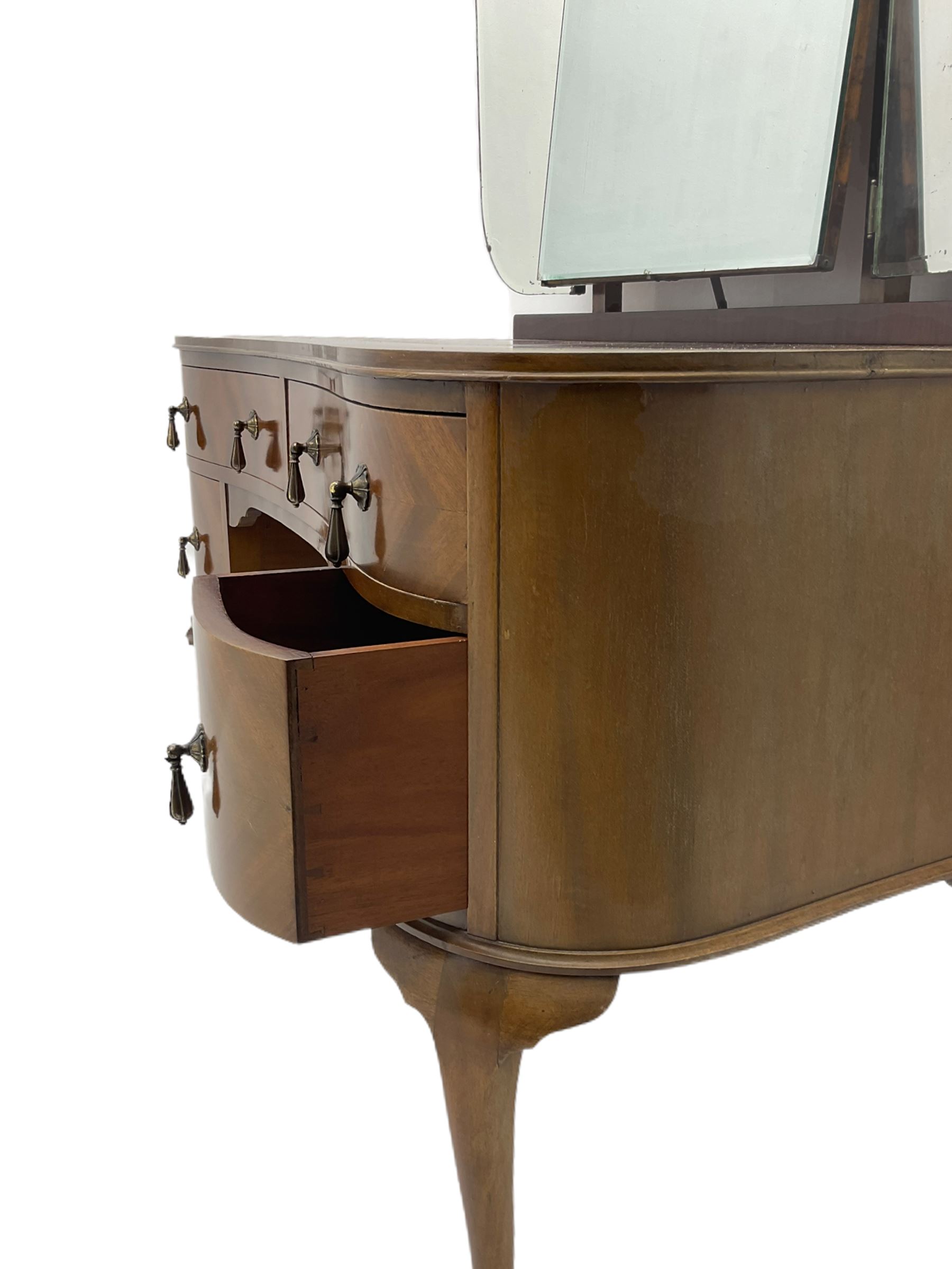 Mid-20th century kidney shaped mahogany dressing table, raised triple mirror back, fitted with four drawers, on cabriole supports