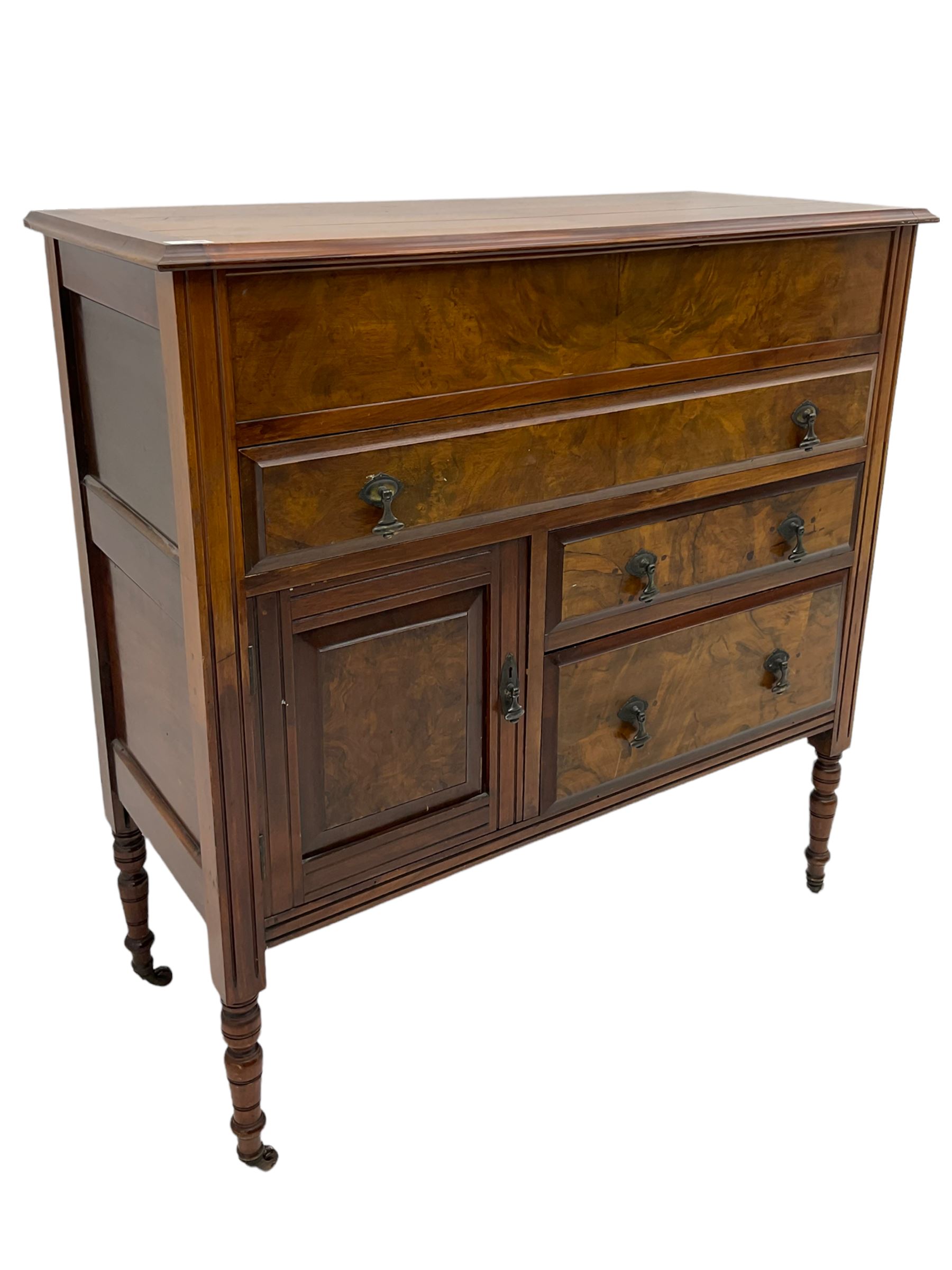 Edwardian walnut gentleman's tallboy, moulded hinged lid enclosing divisions, long drawer over two short drawers and panelled cupboard, turned supports terminating at ceramic castors