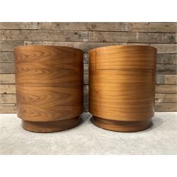 Four walnut circular barrel shaped lamp tables, fitted with single drawer