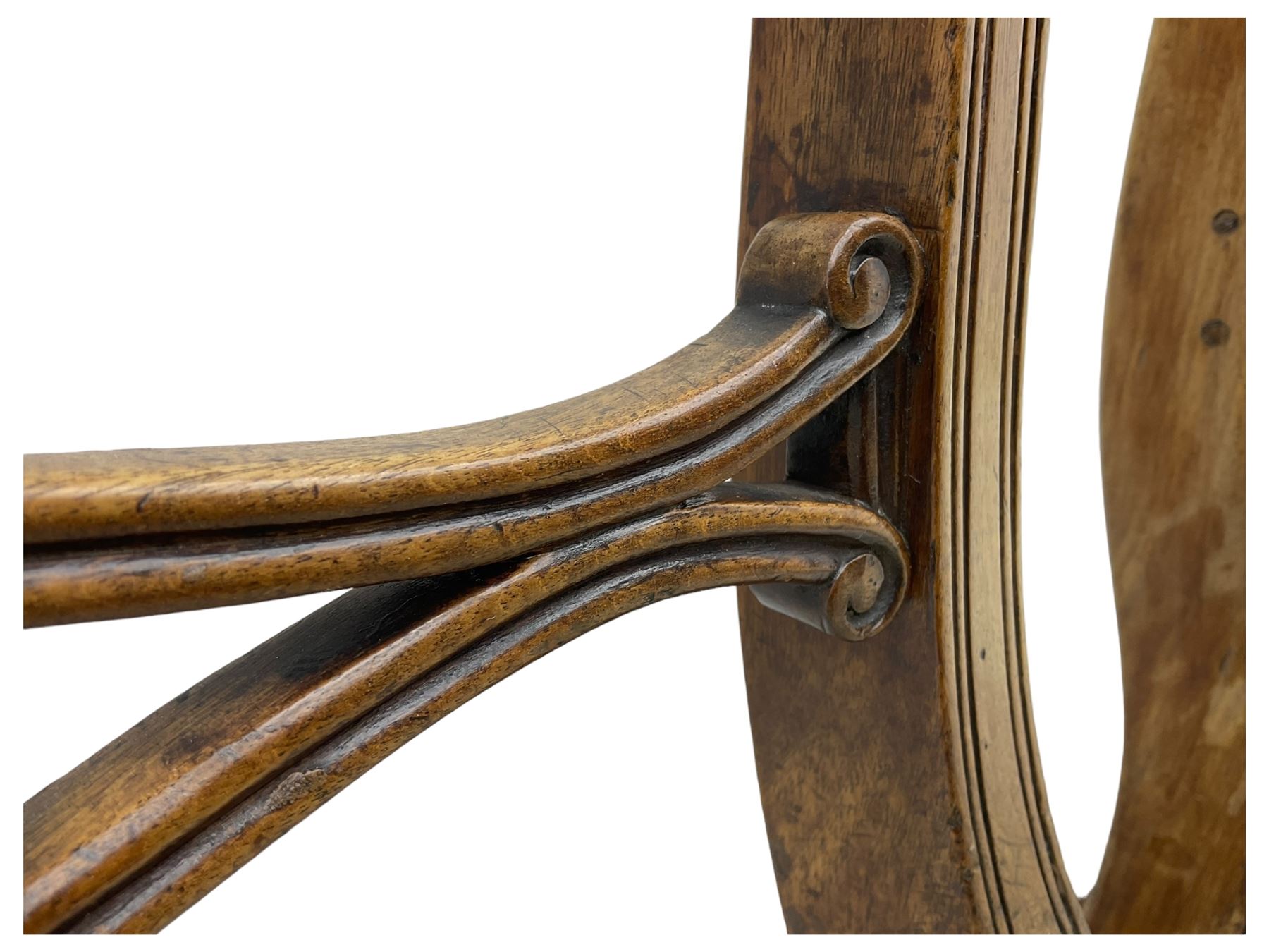 Set of six early 19th century mahogany dining chairs, bar cresting rail over pierced and shell carved middle rail, reed moulded uprights, upholstered seats on reed moulded sabre supports 