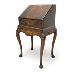 20th century walnut bureau, hinged fall front with moulded edge and cross banding over single drawer, the interior fitted with six pigeonholes and three drawers, on shell and bell flower carved cabriole supports, scalloped apron and side rails 