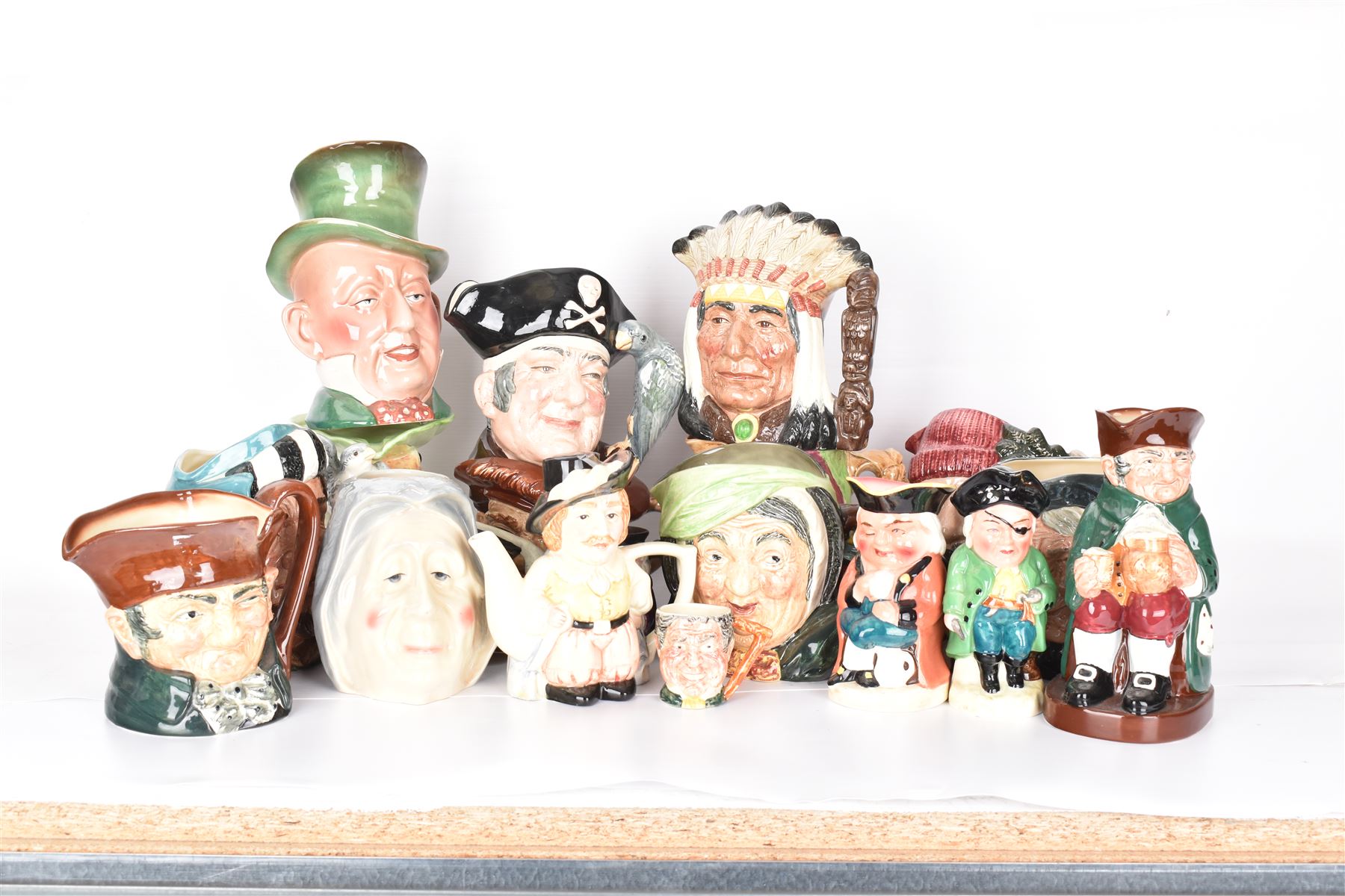 Collection of character jugs, including Royal Doulton Long John Silver, The Falconer, Granny etc