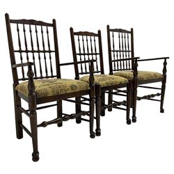 Set of six (4+2) 20th century oak spindle back dining chairs, with upholstered drop-on seat cushions, turned supports joined by turned stretchers