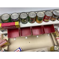 Late 1950s continental red and white painted wooden diorama of a grocery shop interior with fitted shelves and drawers and freestanding 'glazed' counter, fully stocked with miniature tin cans and packets of food L42cm H23cm D22cm