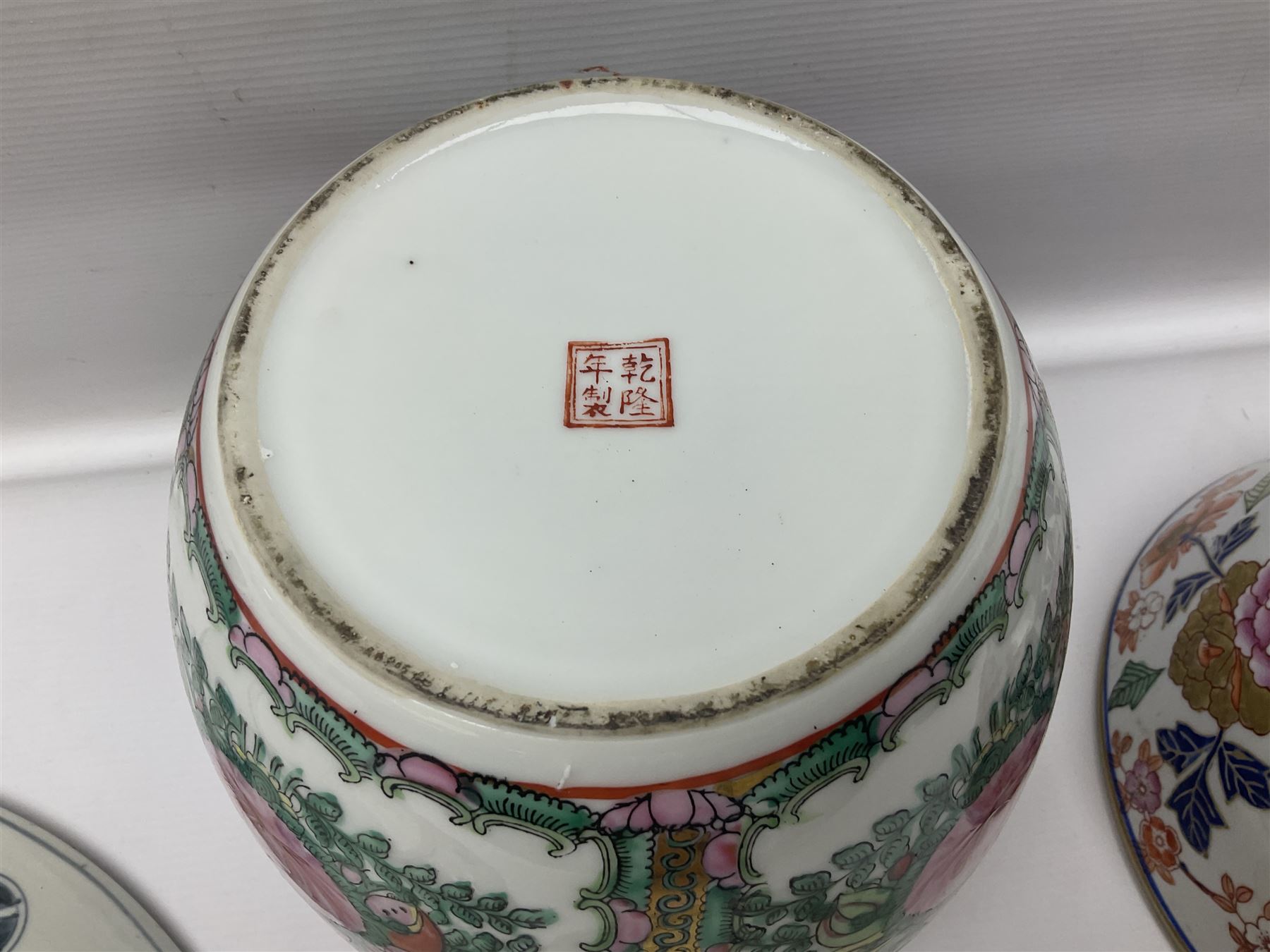 19th century and later Chinese ceramics, to include charger, with hand painted floral and foliate decoration, footed bowl, decorated in enamel with birds amongst prunus blossom,  a smaller plate decorated with figural panels and a ginger jar with cover, with hand painted floral decoration and four character marks beneath, charger D40.5cm