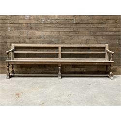 Victorian pitch pine bench pew, turned arms and legs, rail back with plank seat, 276cm