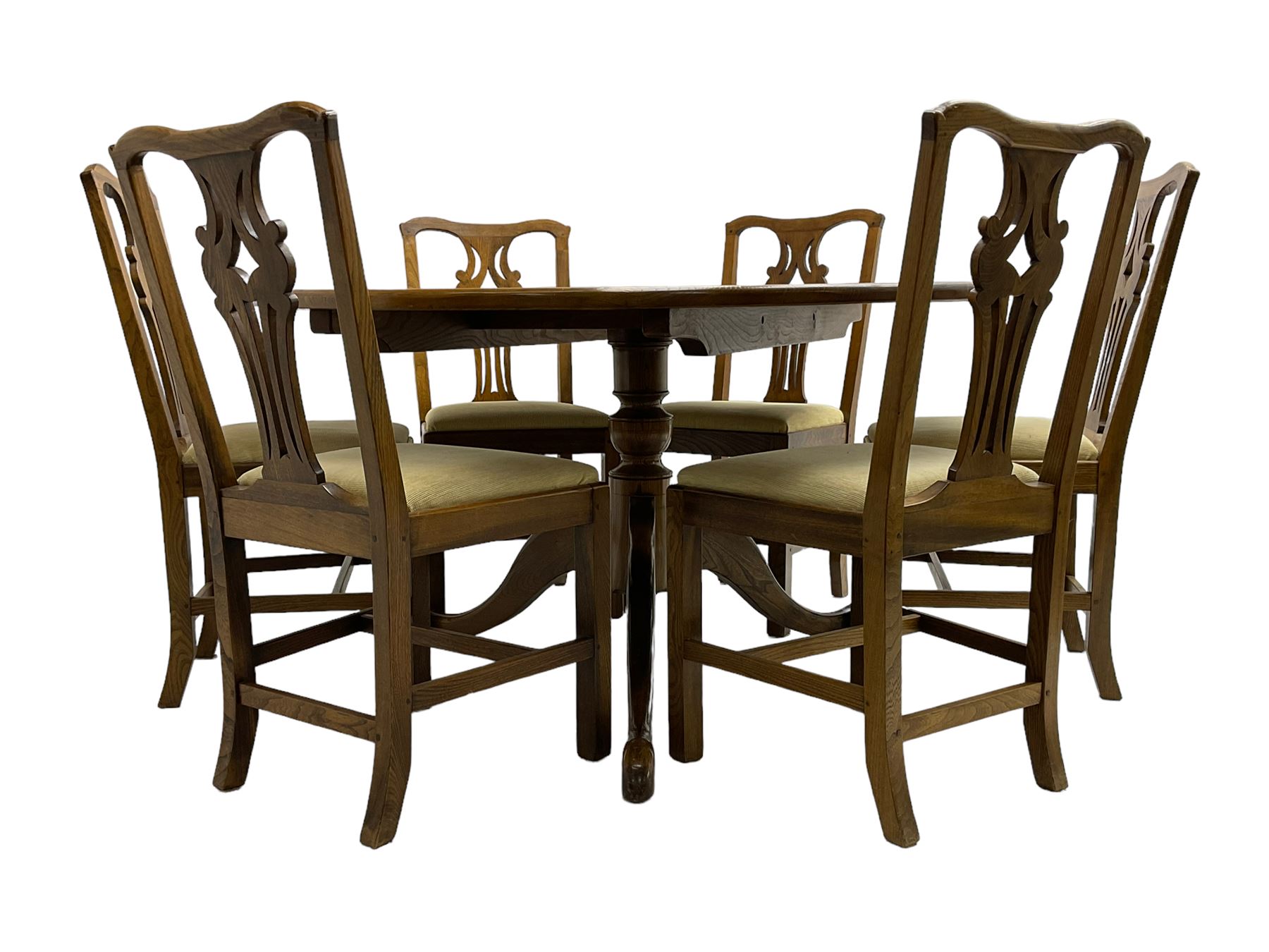 David Shackleton of Snainton - circular figured elm dining table, turned pedestal column on three splayed supports; together with a set of eight dining chairs, shaped cresting rail over shaped and pierced splat, upholstered drop in seat, on square supports united by stretchers 