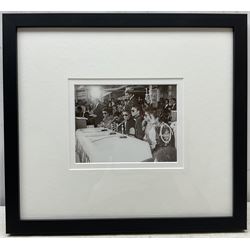 After Andy Warhol (American 1928-1987): 'The Jacksons and Don King', gelatin silver print, label with reference 13463 verso 12cm x 16cm