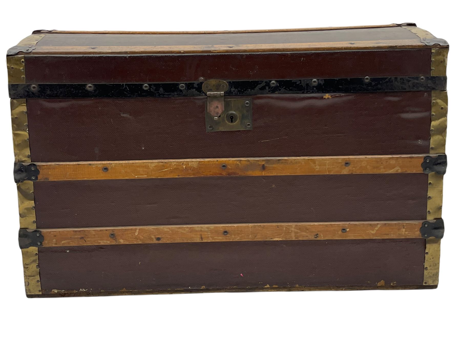 Early to mid 20th century wood and metal bound trunk, with hinged dome lid