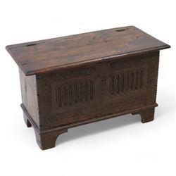 18th century and later plank kist, rectangular form, moulded hinged lid over guilloche and fluted front with chip carved edge, on bracket feet 