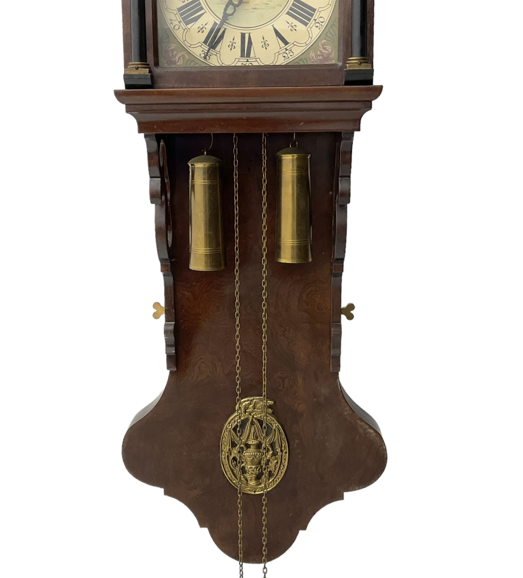 20th century weight driven Dutch WUBA wall clock -  with a break arch top and mounted gilt figures to the arch, painted dial with working moon disc, chapter ring with Roman numerals and pierced steel hands, twin train chain driven movement striking the hours on a bell. With pendulum and brass cased weights.