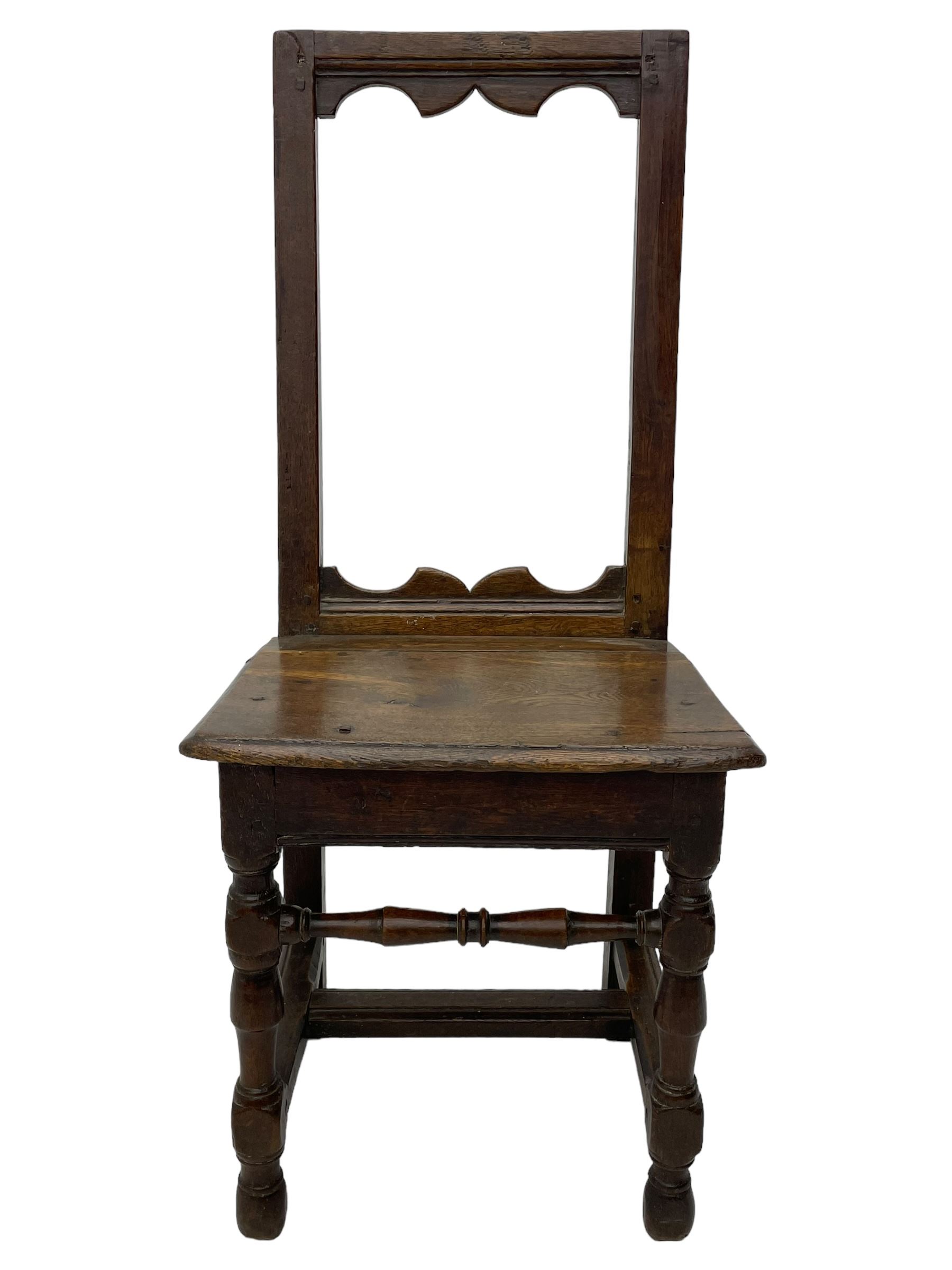 Small late 17th century oak side chair, open frame back with shaped upper and lower brackets, moulded plank seat, on turned supports united by moulded H-shaped stretchers