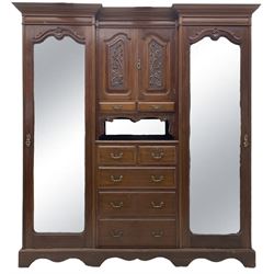 Late Victorian walnut reverse break-front triple wardrobe, projecting moulded cornice over...