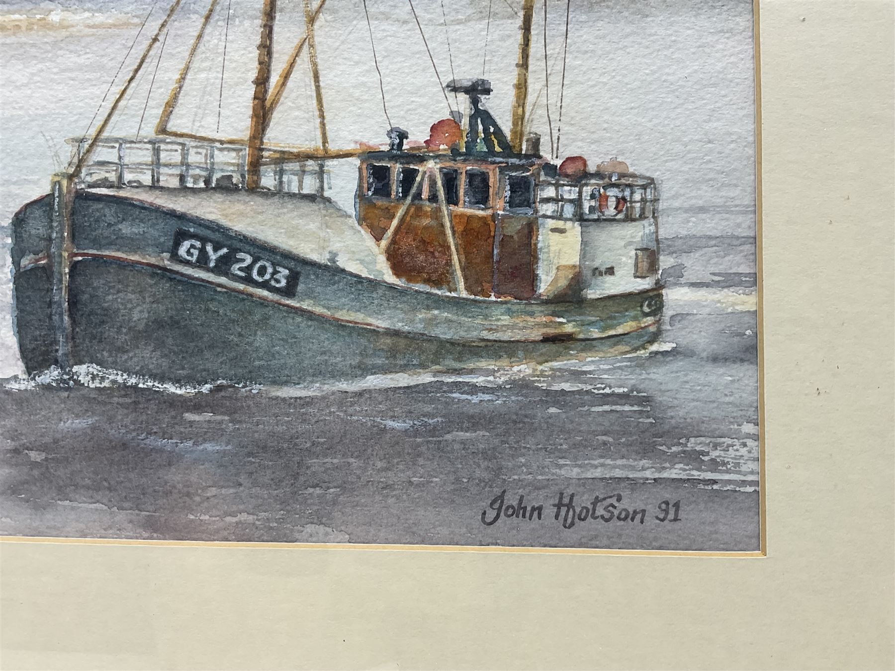 John Hotson (British 20th century): Grimsby Fishing Trawlers at Sea, watercolour signed and dated '91, 28cm x 38cm