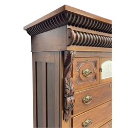 Late Victorian walnut Scotch chest, projecting cornice with turned quarter column mounts over matching half column to frieze, fitted with two upper short drawers with central cupboard, bevelled mirror glazed cupboard door, four graduating drawers below, foliage and flower head carved brackets to the uprights, panelled sides, chamfered plinth on turned feet