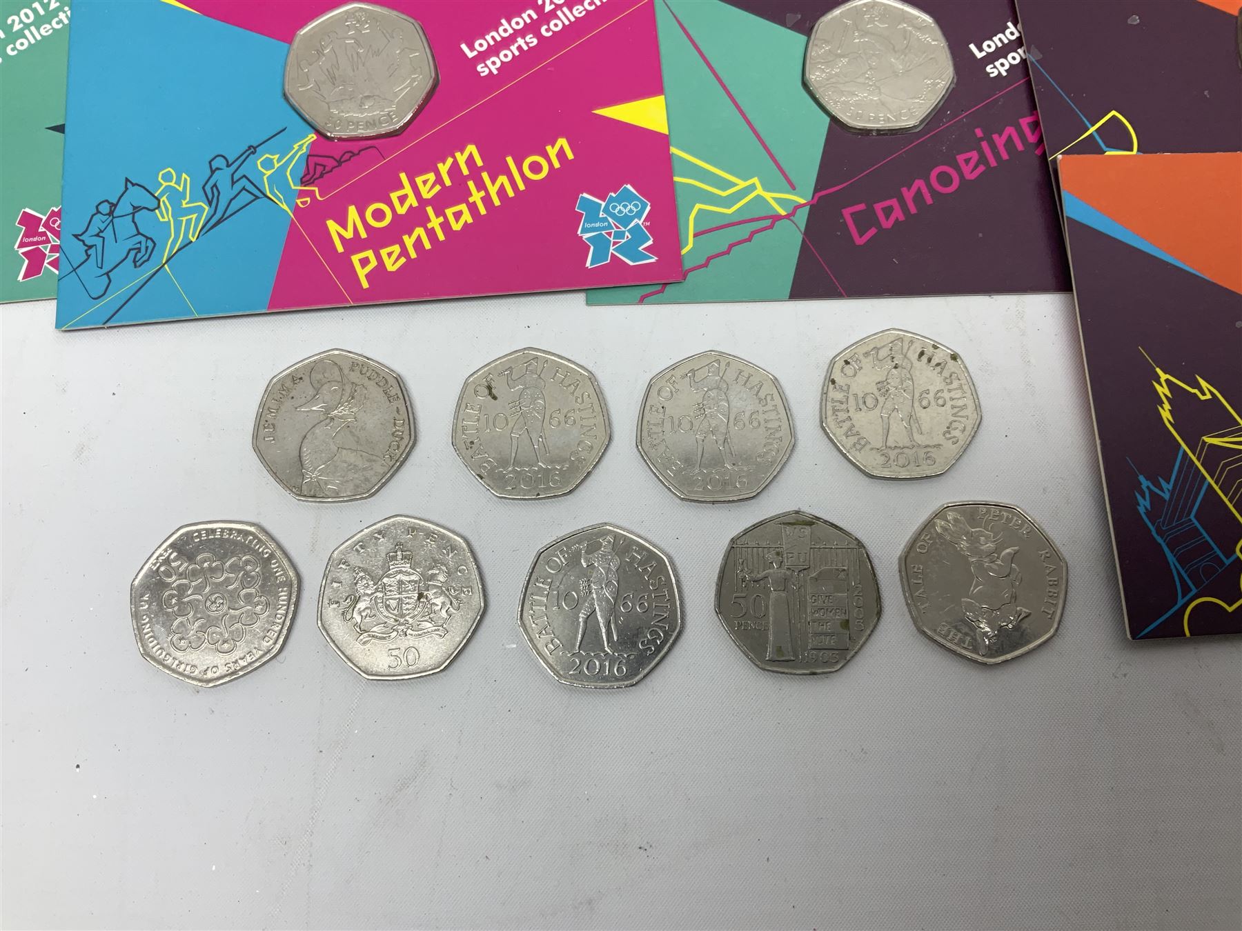 Queen Elizabeth II mostly Great British commemorative fifty pence coins, including London Olympics 2012 sports collection coins on cards, other loose Olympic games, Beatrix Potter, 2022 '1952-2022' fifty pence in plastic holder etc