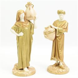 Pair of Royal Worcester figures of Egyptian water carriers after James Hadley dressed in gilt cloaks and on circular bases H24cm, number 1250, date code for 1913