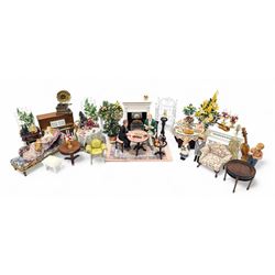 Dolls house furniture, including pianos, fireplace, plants, flower arrangements, tables, c...