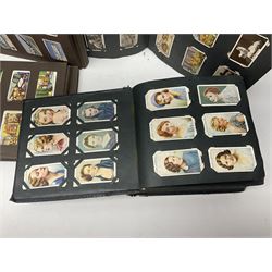 Four albums of cigarette cards, including Will's and Player's examples