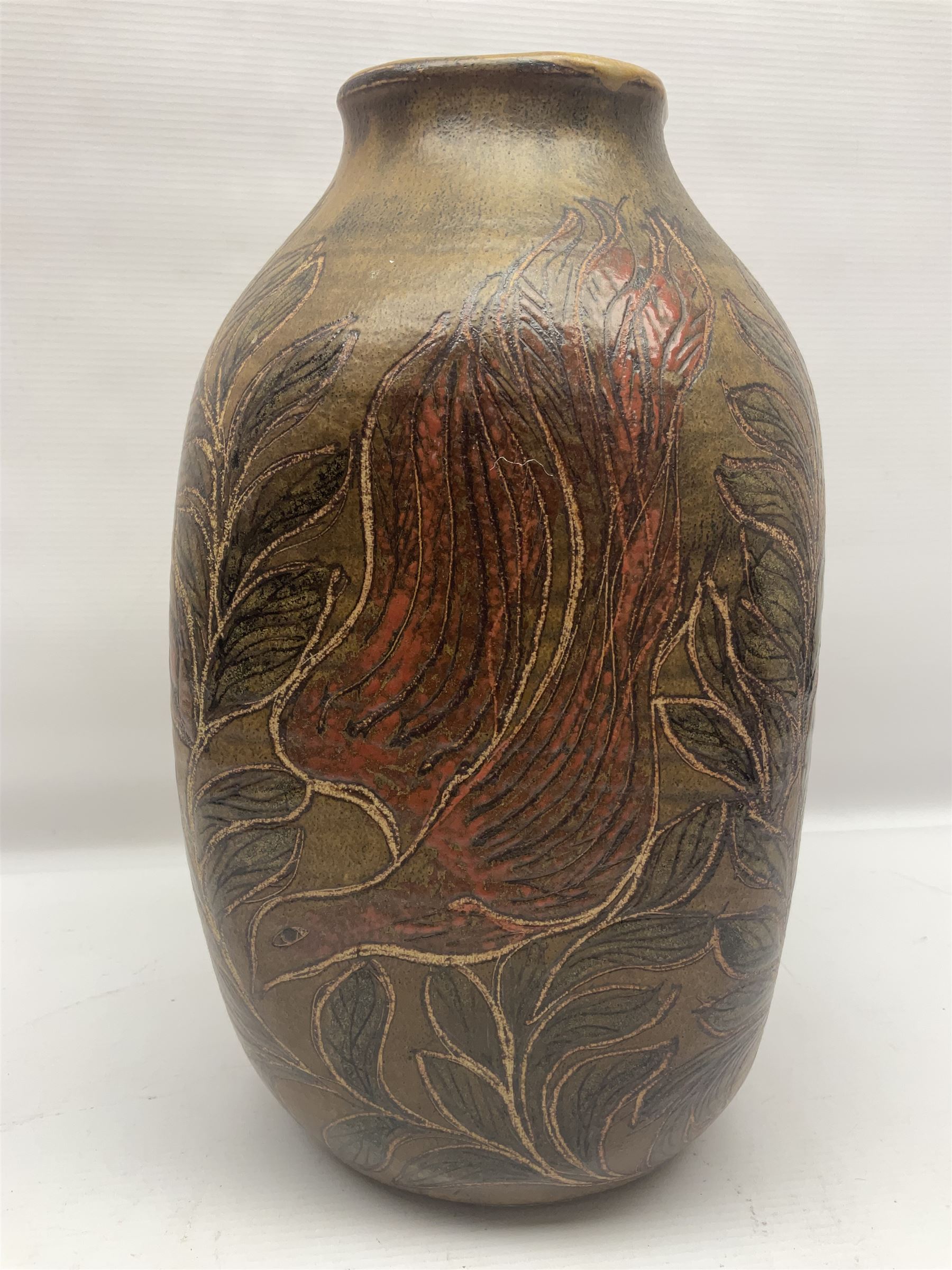 John Egerton (c1945-): studio pottery stoneware vase decorated with red birds in foliage, upon a brown ground, H34cm