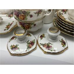 Royal Albert Old Country Roses pattern part tea and dinner service, to include two tureens, eight dinner plates, six side plates, twelve bowls, two mugs, seven teacups and saucers, milk jug,  twelve cake plates, six soup bowls and saucers, candlesticks, etc (95)