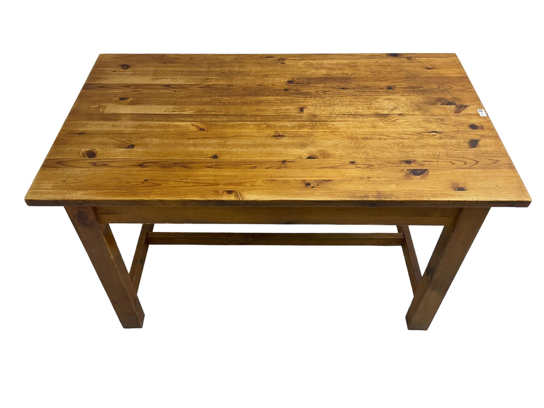 Traditional waxed pine kitchen or dining table, rectangular top over square supports united by H-stretcher