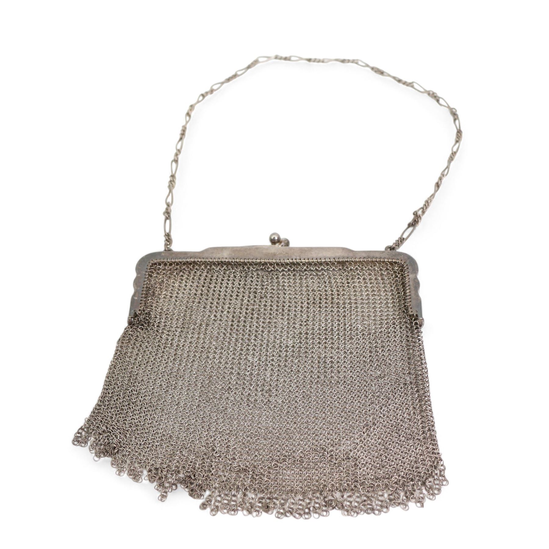 Silver mesh evening purse with long and short link strap, hallmarked import Birmingham 1913, together with an iron mesh evening purse with acorn drops, and a silver hair comb (3)