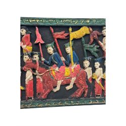 Rectangular relief carved and painted wall hanging panel, depicting ceremonial procession with soldiers and flag bearers on horses and elephants