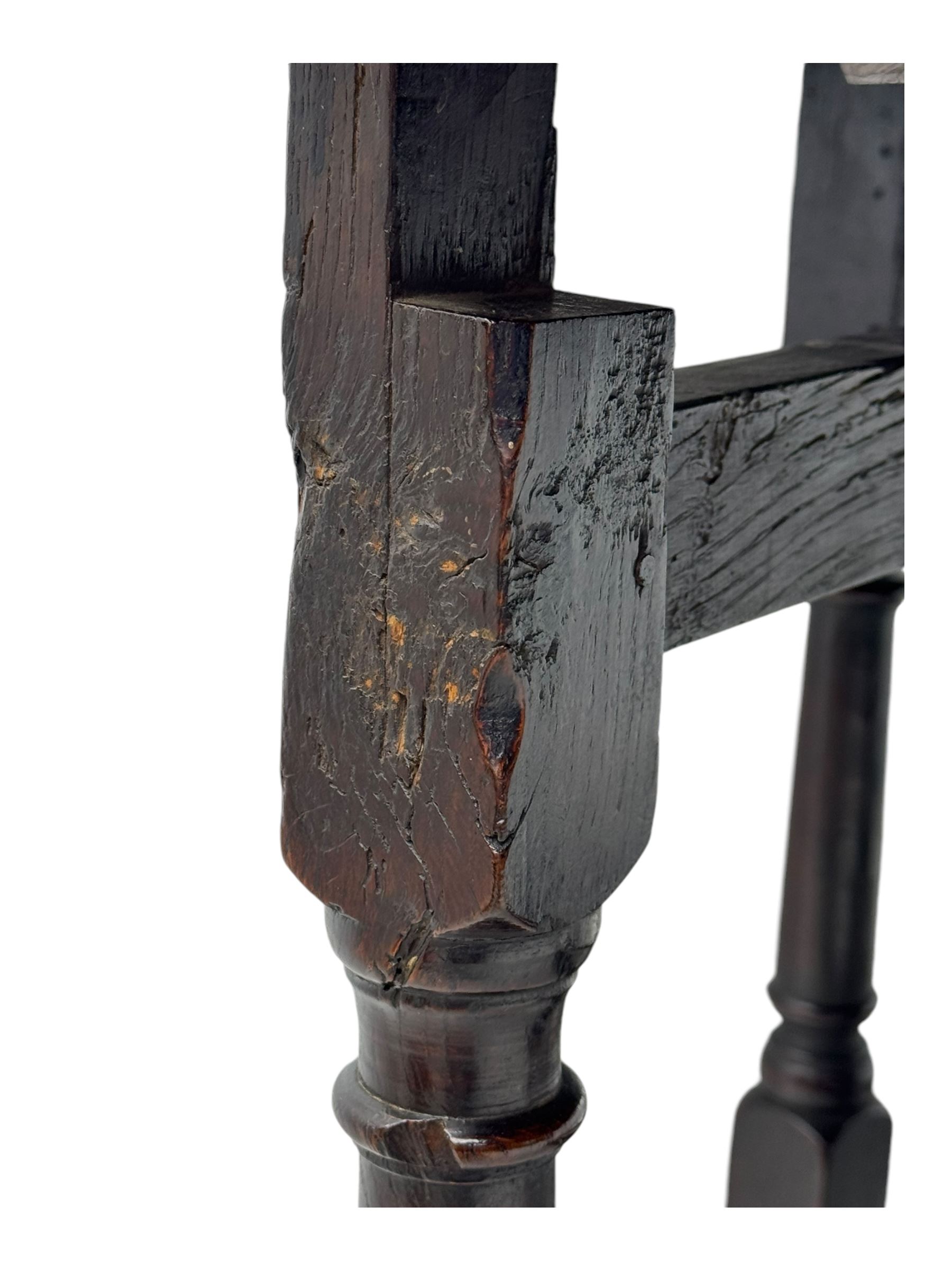 18th century oak dining table, oval drop-leaf top on gate-leg action base, turned supports united by stretchers 