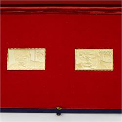 'Sir Winston Churchill Stamp Replicas' set of two hallmarked eighteen carat gold stamp replica ingots, total weight approximately 40.3 grams, cased with certificate and commemorative stamp cover