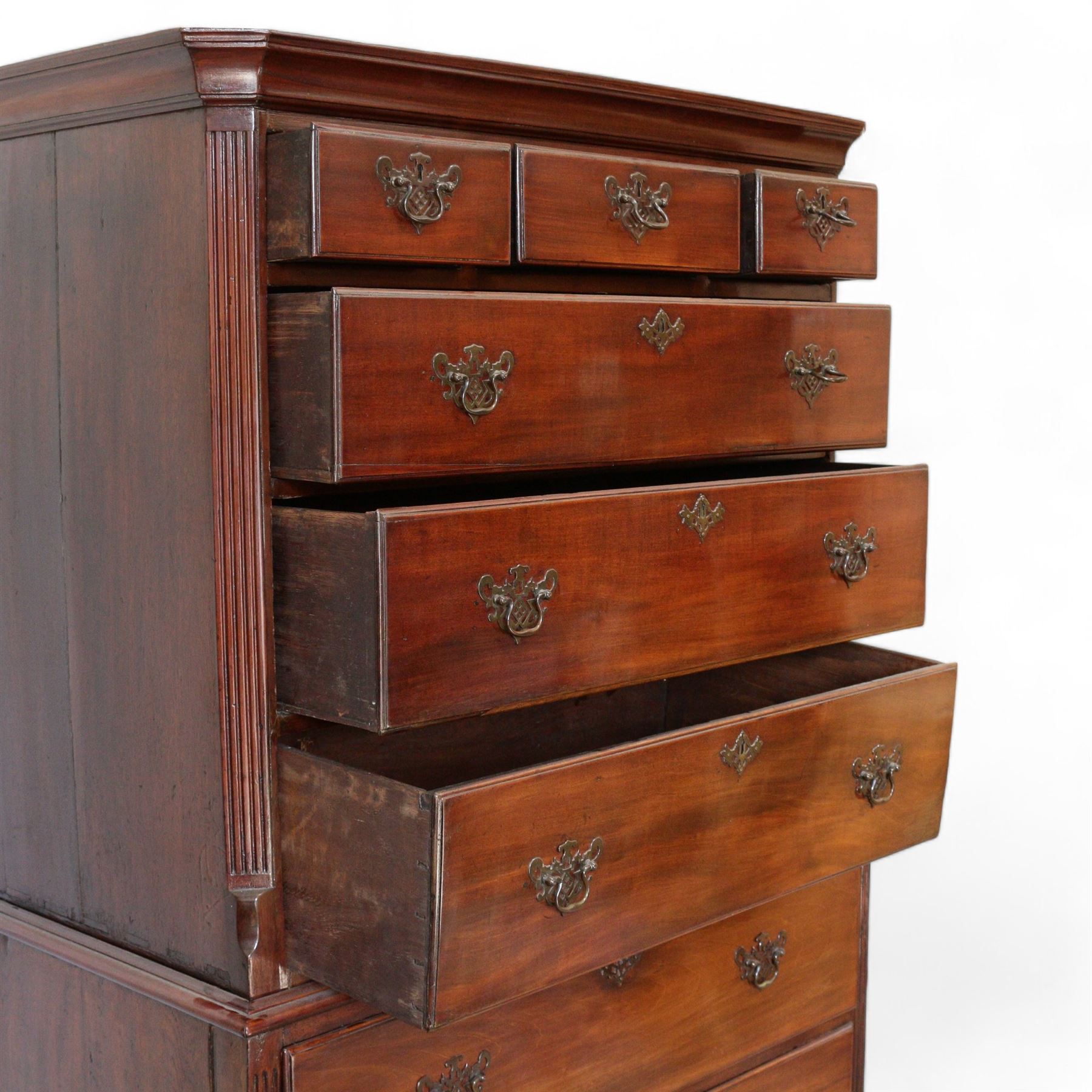 George III mahogany chest-on-chest, projecting moulded cornice, fitted with three short over six long graduating drawers, on bracket feet