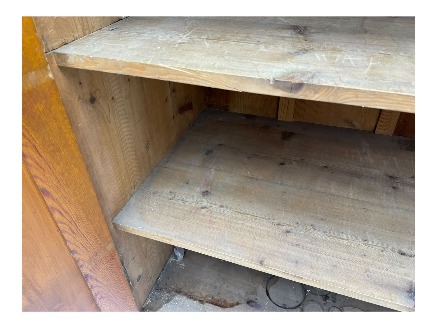 Large 19th century pine cupboard, rectangular top over two panelled later doors, enclosing four open shelves, on plinth base