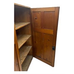 Large 19th century pine cupboard, rectangular top over two panelled later doors, enclosing four open shelves, on plinth base