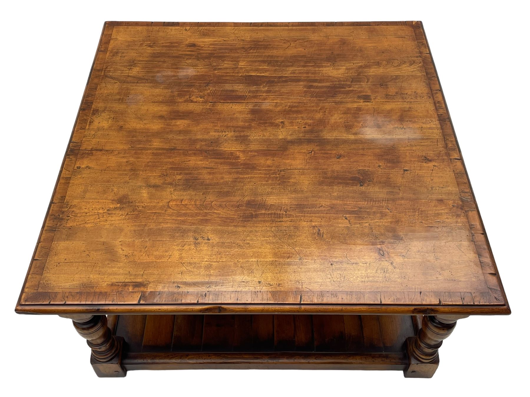 Square elm coffee table, square ovolo-moulded top with fruitwood band, turned supports united by undertier 