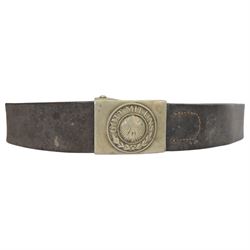 WWII German army die struck belt buckle 'Gott Mituns' with brown leather belt, together with piece of canvas from a german wagon, marked with the form of army eagle with swastika 