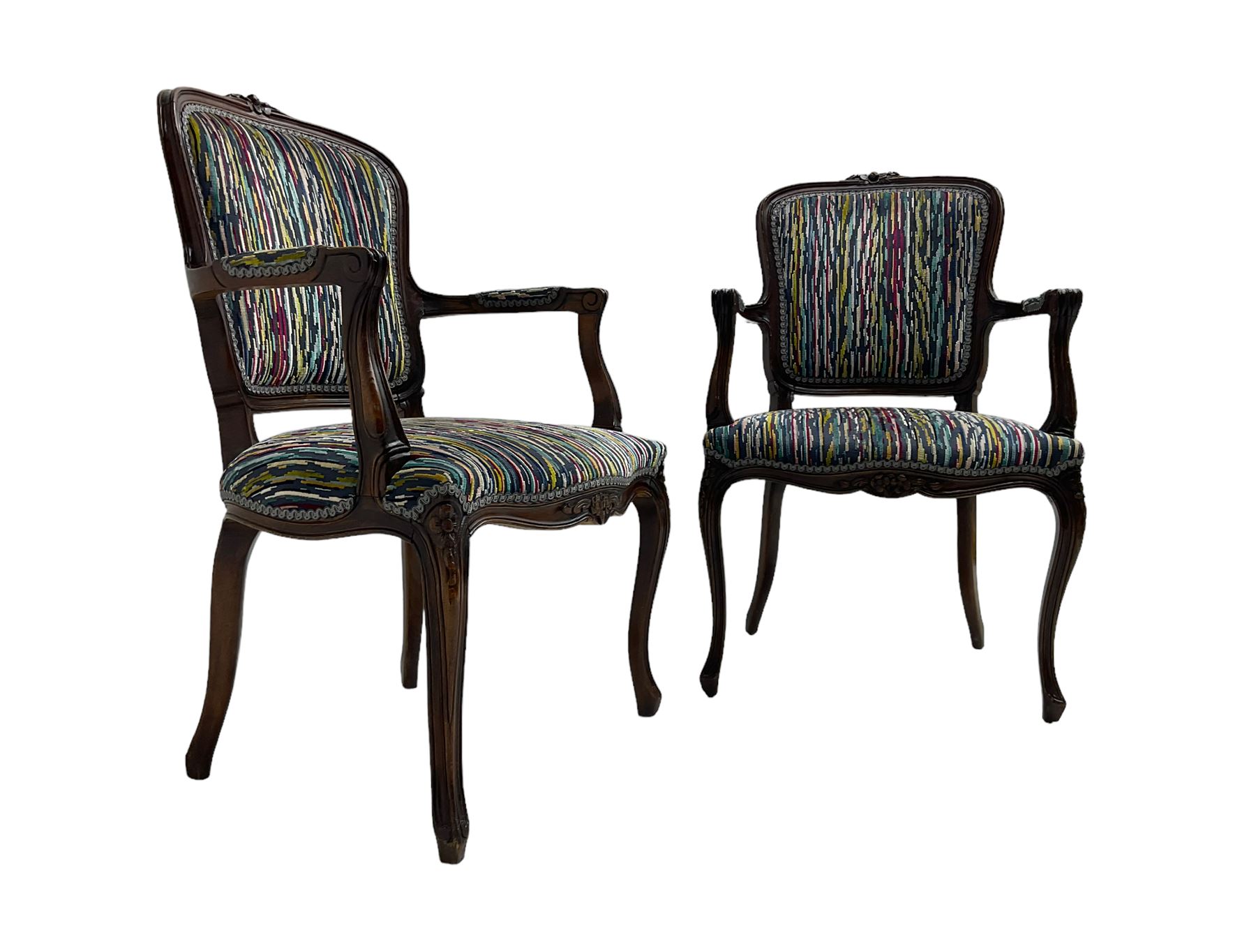 Pair of French design open armchairs, the moulded frame carved with flower heads, upholstered seat, back and arms, on cabriole supports