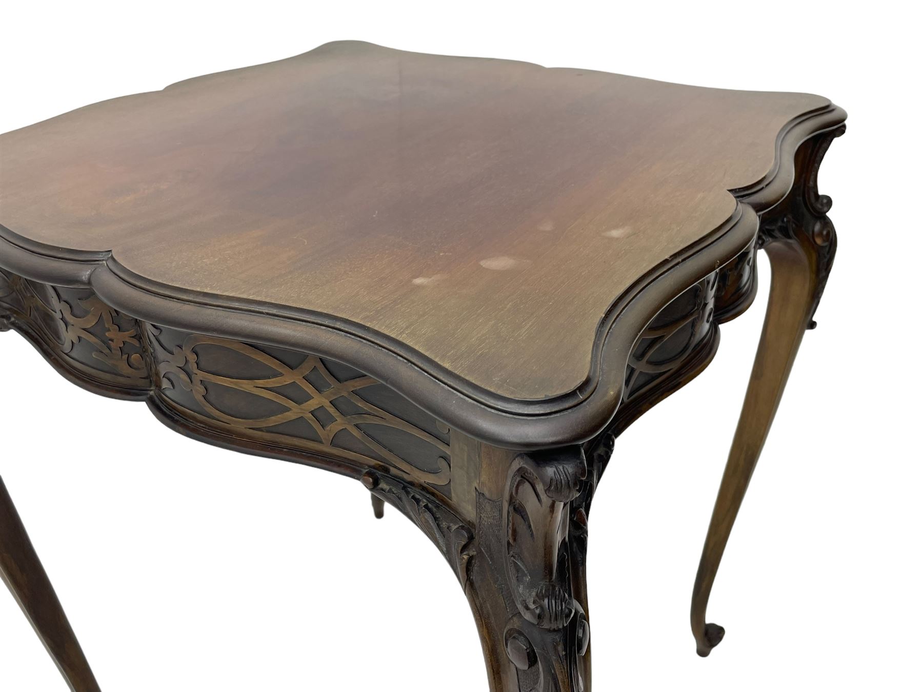 Early 20th century mahogany centre table, shaped moulded top over shaped frieze rails decorated with blind fretwork, on C-scroll and acanthus leaf carved cabriole supports with scrolled terminals 