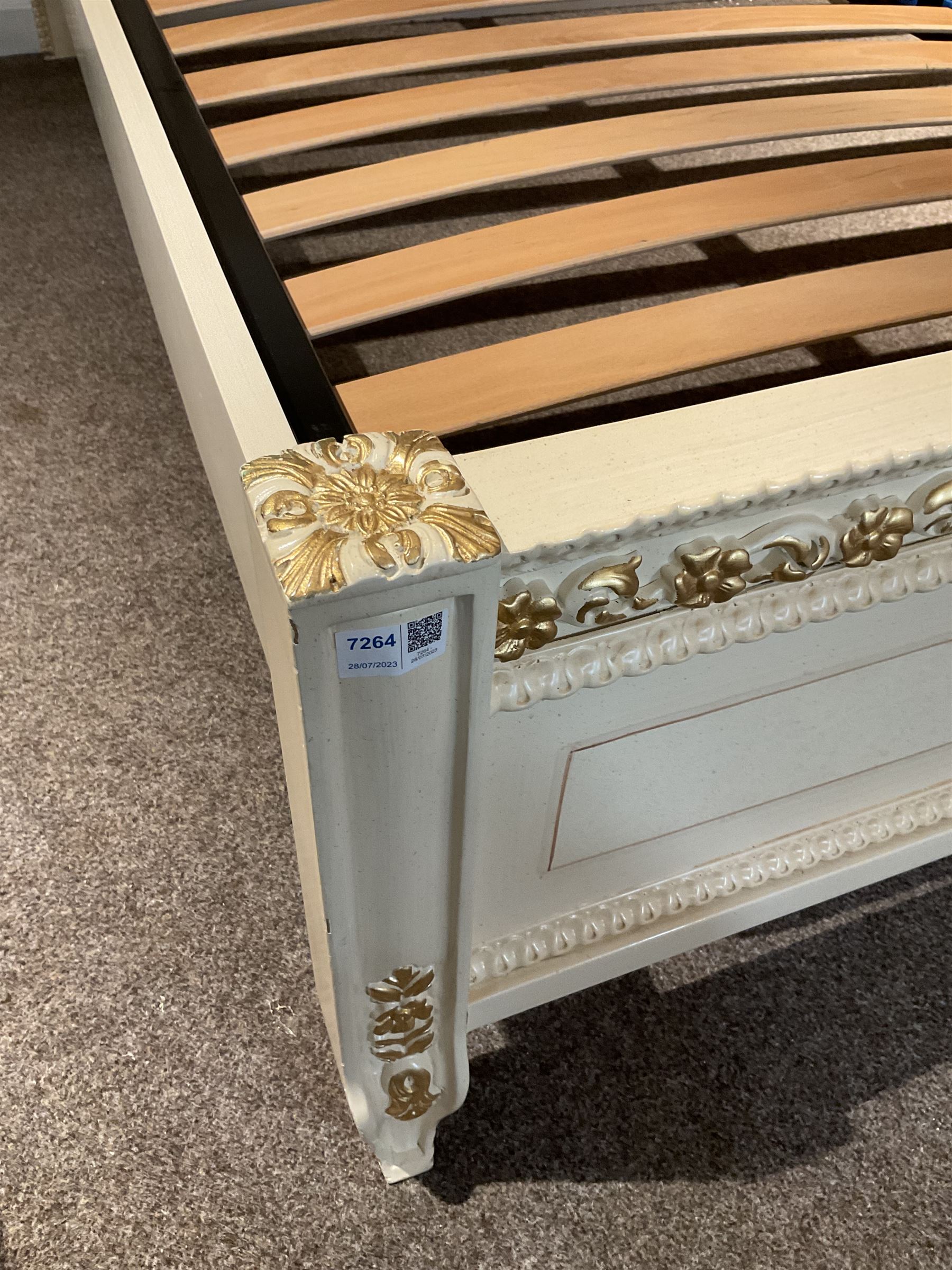 Barnini Oseo - super king 6' 'Reggenza' bedstead, the headboard with a pierced cartouche pediment with extending scrolling foliage, decorated with trailing gilt flower heads, upholstered in buttoned lilac velvet, raised on cabriole feet, in a cream finish